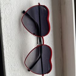 Two Pairs Of Heart Shaped Sunglasses