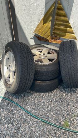 Jeep wrangler tires with rims and sensors