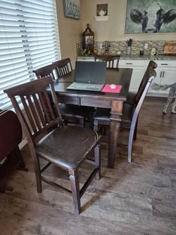 Dinning room table and 8 chairs