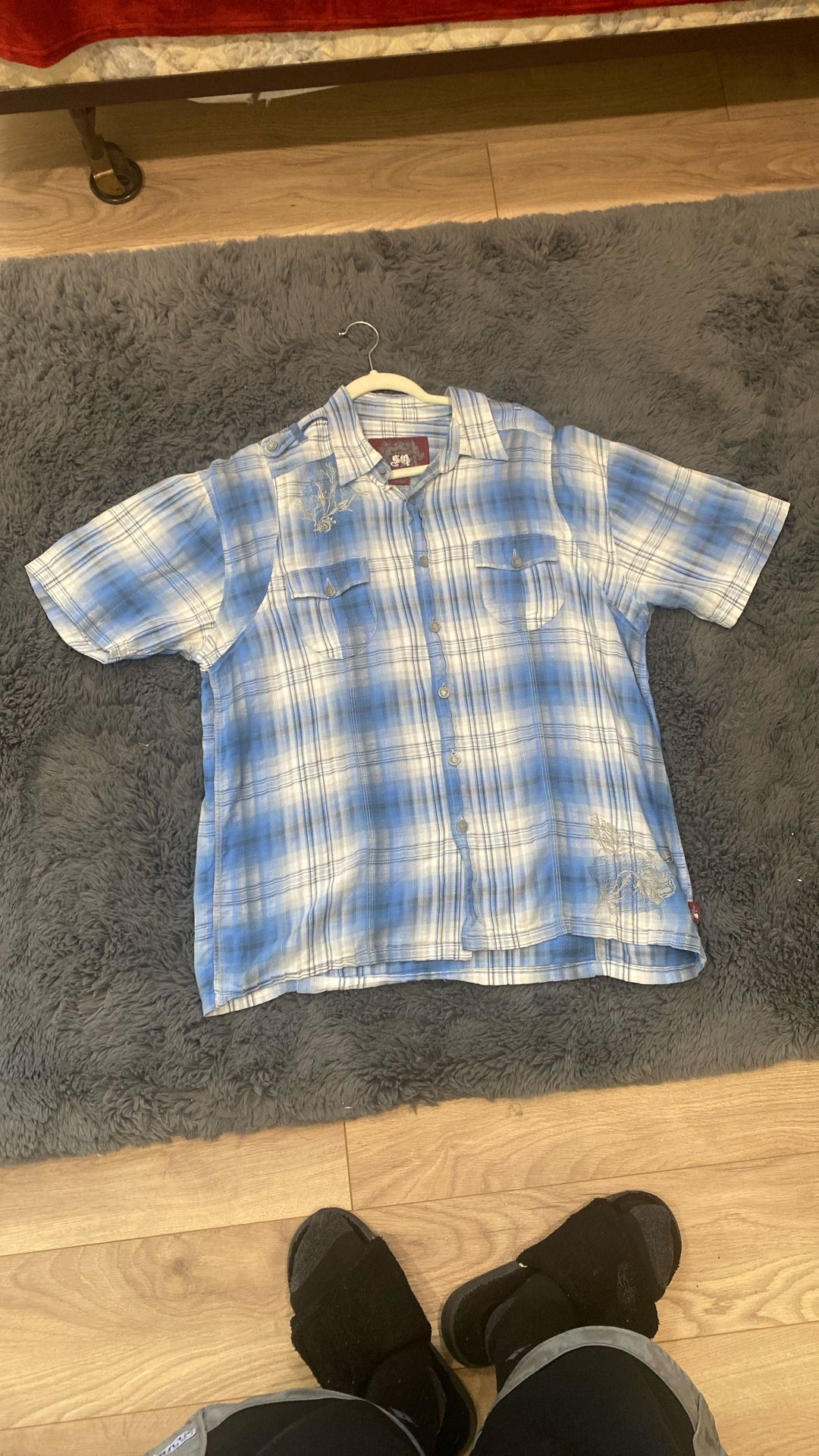 S Q blue button up