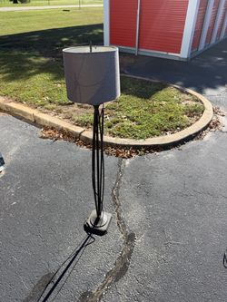 Black floor lamp with gray shade