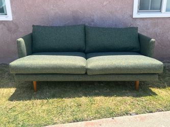 Green short indoor couch
