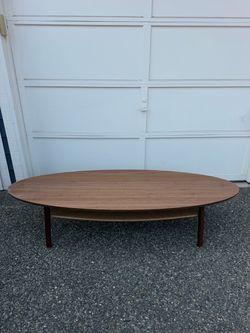 IKEA Oval Wood Coffee Table with Woven Shelf