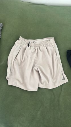 Nike cream running shorts
