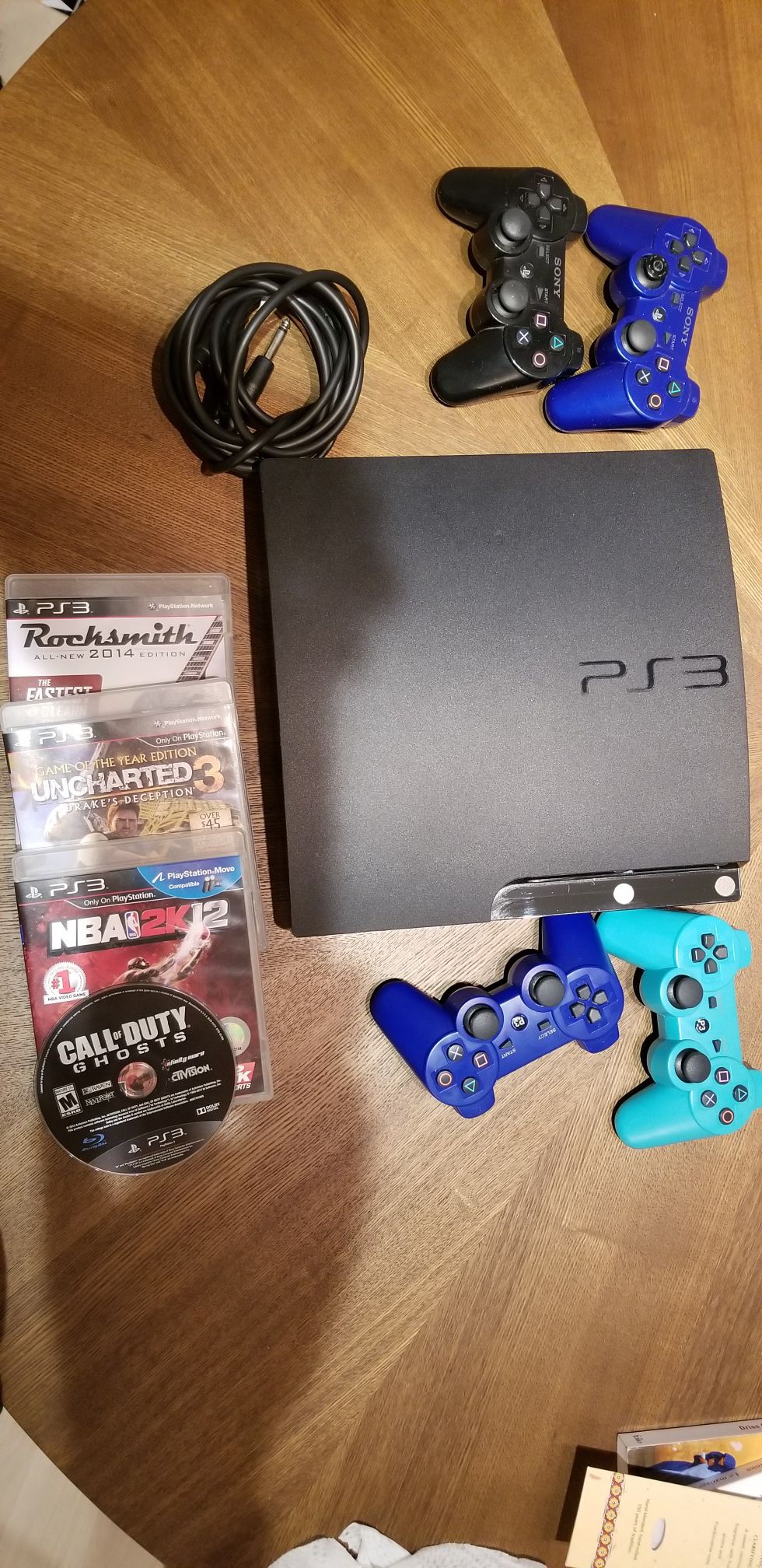 Used PS3 slim 150G with 4 Games
