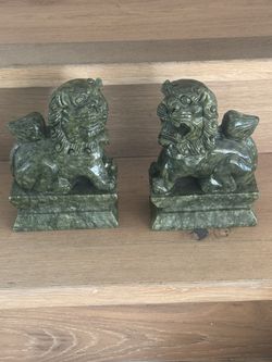 Male And Female stone lions 