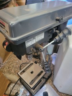 2 drill press. 1 central 5 speed with work light, other power glide 5 speed with laser