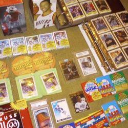 HUGE LOT OF BASKETBALL CARDS AND FOOTBALL CARDS AND BASEBALL CARDS AND PRETTY MUCH EVERYTHING