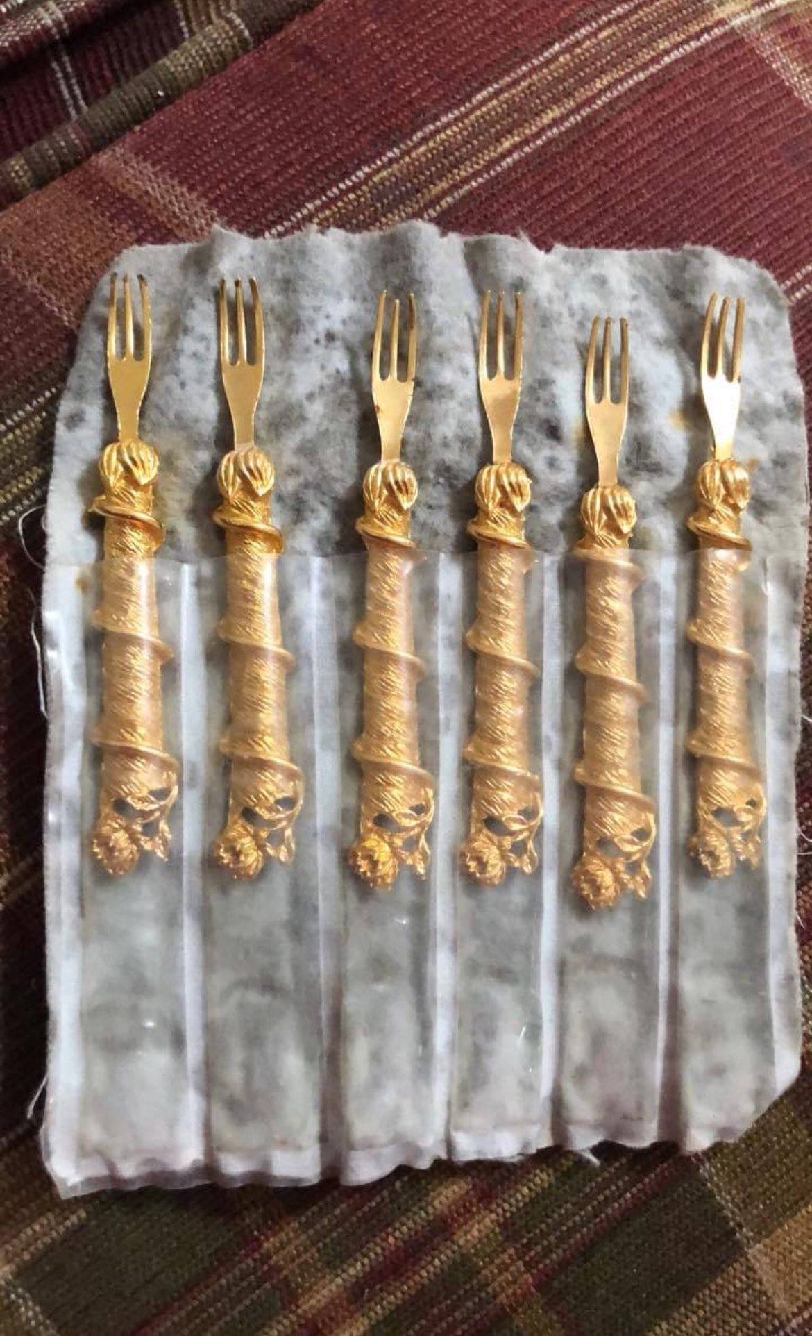 6 Gold tone cocktail or oyster forks