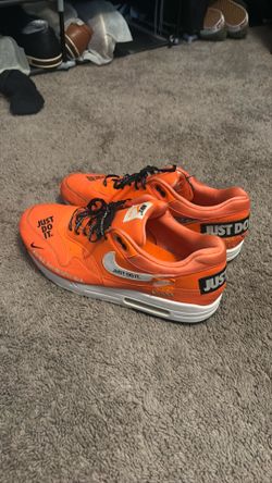 Orange Nike just do it shoe size 13