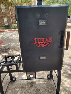 Vertical barbecue pit smoker