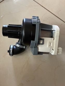 dishwasher circulation pump and motor assembly, which closely resembles replacement part W11032770 or W10510667…
