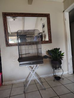 Used Heavy Duty Metal Bird Cage, H 29 1/2" x W 19 1/2" x D 19 1/2". Only the cage, **table not Included**