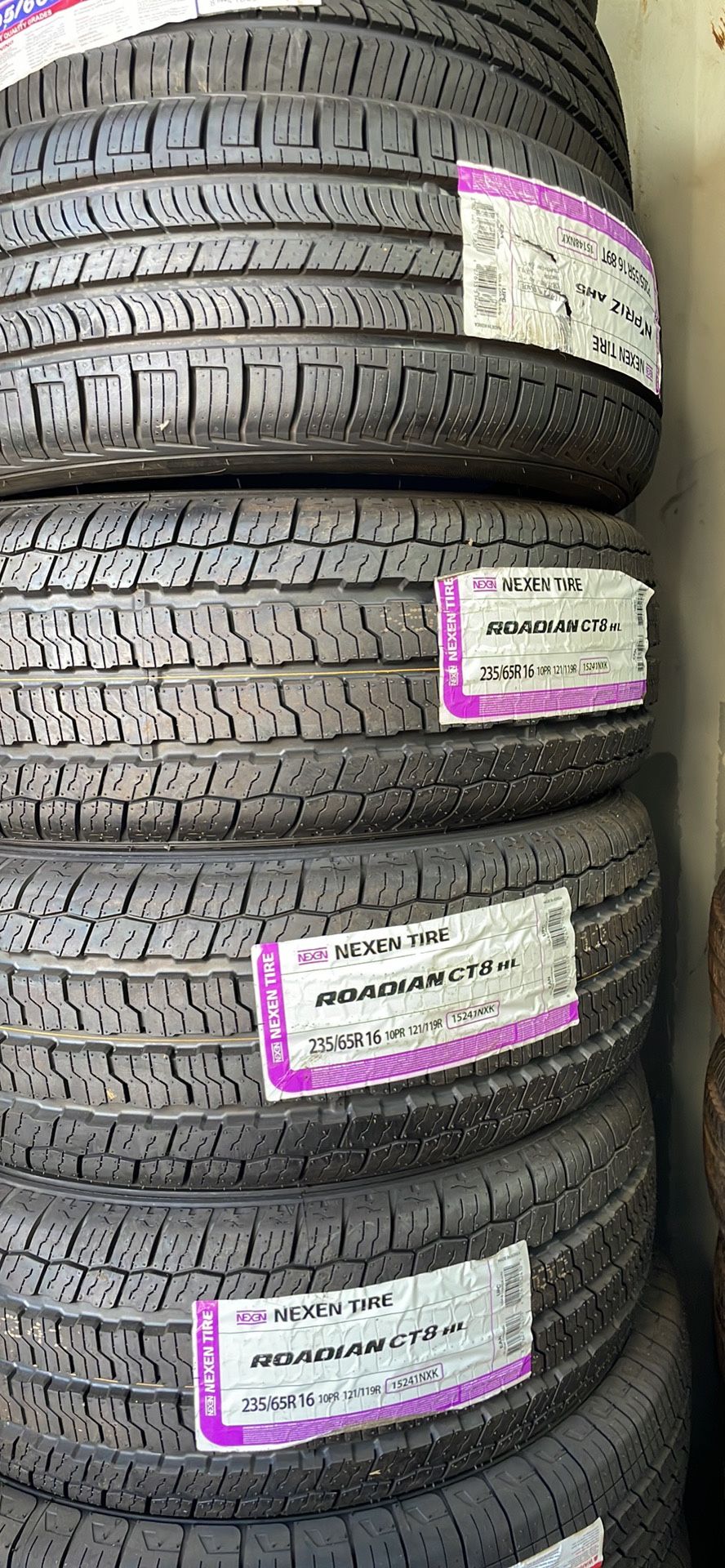 235-65-16 NEXEN All Season Tires installed (4) New 70,000 Mile Warranty-We Finance