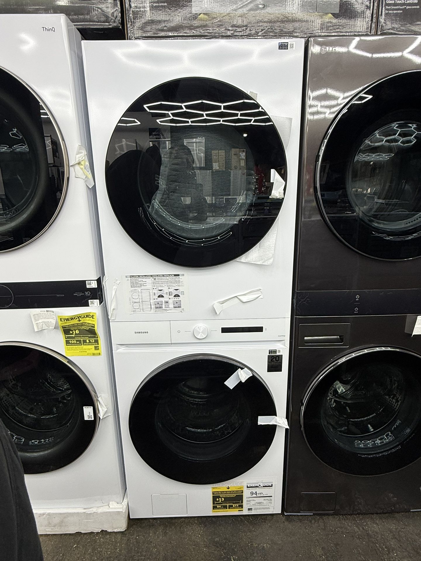 Brand new Samsung Bespoke 4.6 cu. ft. Capacity Single Unit AI Laundry Hub Washer with Steam Wash and 7.6 cu. ft. Gas Dryer in White