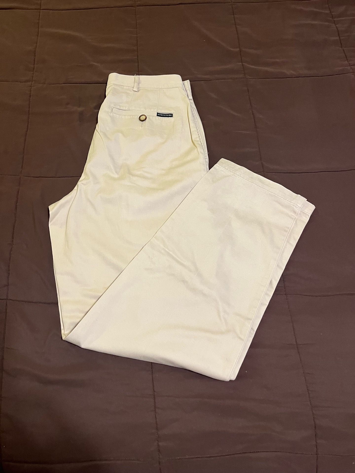 Men’s Pleated Pants Size: 30/32, & 31/32 Structure Brand and a GAP Khakis Size: 31/30. All Are Very Nice, Tan Color and are in Excellent Condition!!