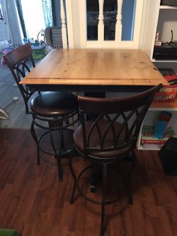 Table with bar stools