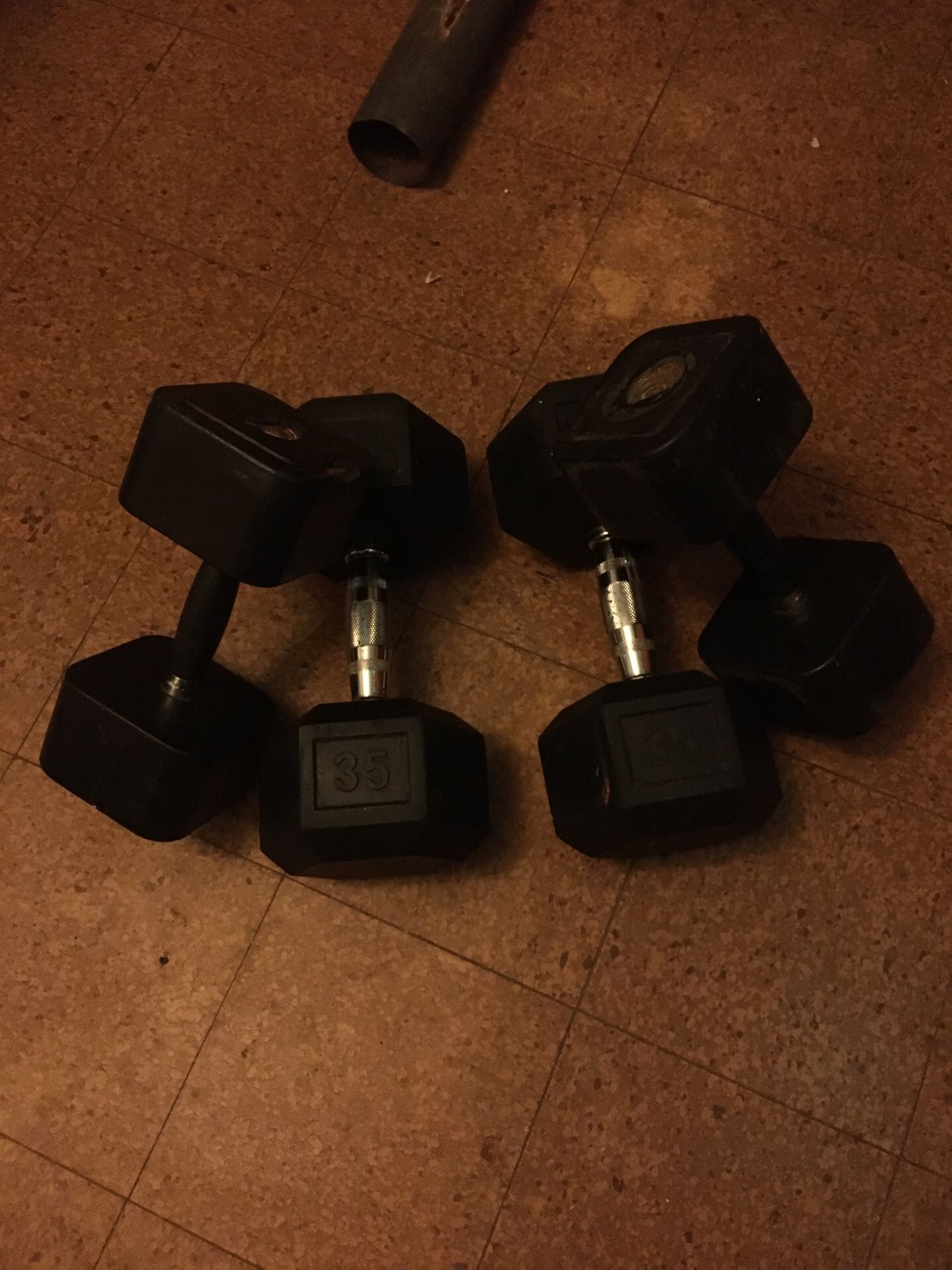 Two 35 and two 25 dumbbells
