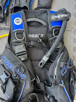Diving BCD vest, size XS, fins, and regulator. Used.