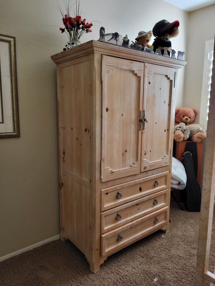 Armoire with TV Swivel and and 3 Drawers