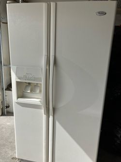 Whirlpool side by side refrigerator