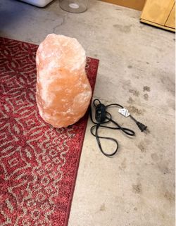 Himalayan salt lamp Roughly 10 inches and 20 pounds