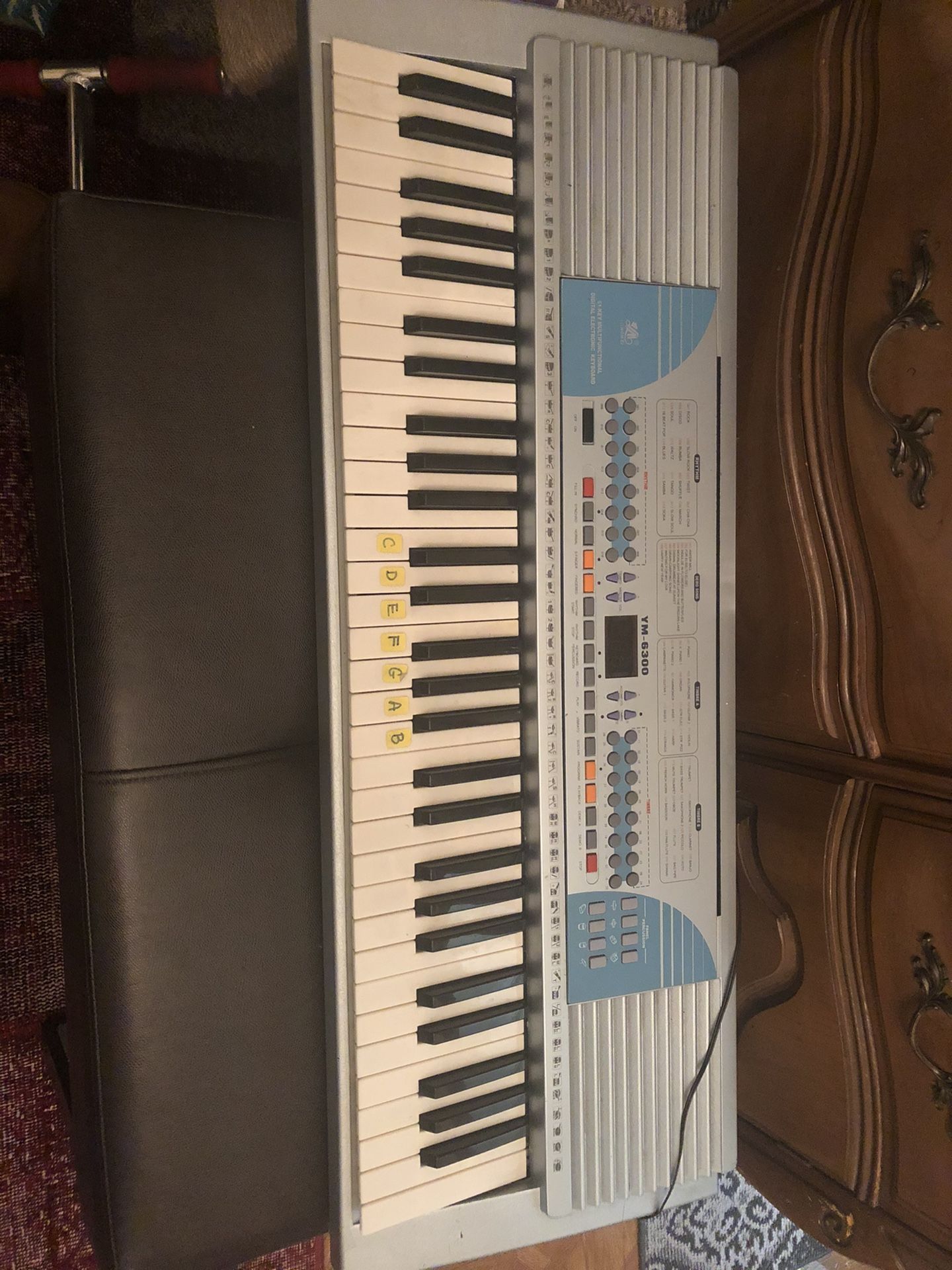Used electric piano with original charger