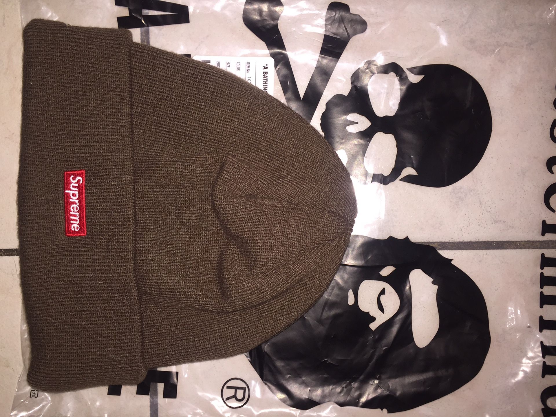 Supreme/New Era Brown Beanie HQ Logo