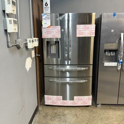 Samsung - 28 cu. ft. 4-Door French Door Refrigerator in Stainless Steel With Water And Ice Dispenser 