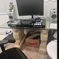 Stone griffin table with glass table top