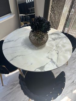Marble table top and 4 black velvet chairs