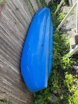 Blue Plastic tandem Kayak and accessories