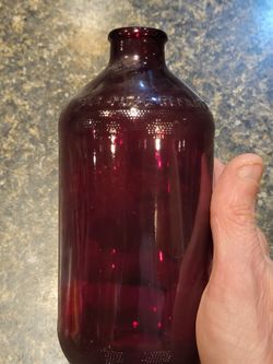 Red glass Rx collectible bottle approx 6" tall