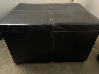 Black leather ottoman storage chest