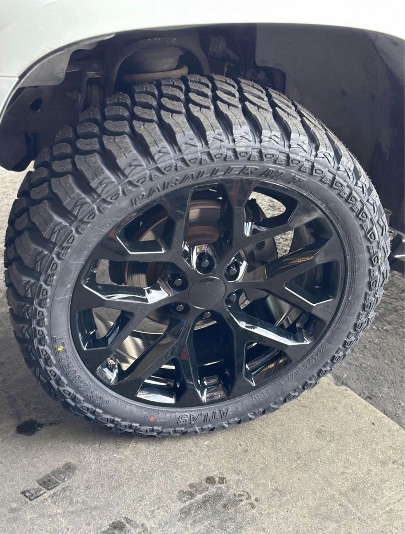 Snowflake 22” black gloss black rims with 33x12.50R22 tires Yukon Tahoe suburban sierra Silverado we finance 