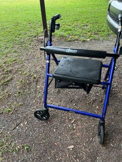 Drive Rollator 4 wheels lseat pouch $35 firm Viva standup adjustable height new condition $85 cash Cecelia dr new port Richey