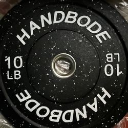 A pair of 10 pounds bumper plates