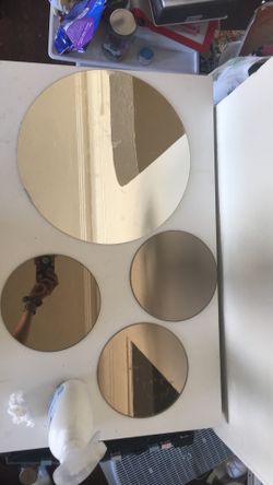 4 circular mirrors