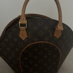 Dentist, Louis Vuitton purse