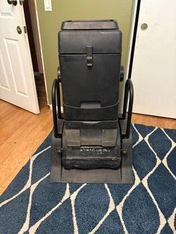 Carpet cleaning machine.