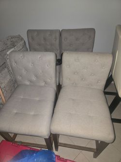 4 gray high chairs