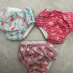 Lot of 3 Green Sprouts and I play Swim Diapers one 6 Months two 12 months