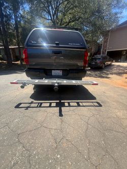 Motorcycle carrier tow hitch
