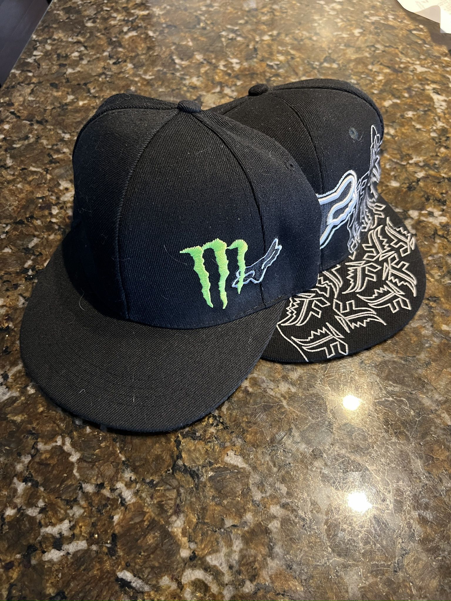 Two Black Fox Racing/Monster Energy Hats, Size 7