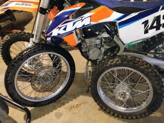 NEW D. O. T APPROVED KENDAL TIRES FNT AND BCK. / USED D. I. D. KTM RIMS