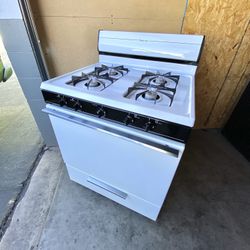 Magic Chef gas stove 4 burners.  30”
