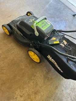 Cordless Yardworks 24Volt 20” Lawnmower and charger needs battery