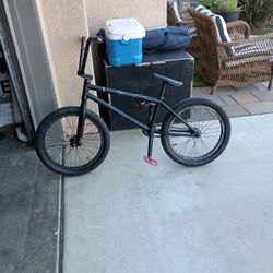 Pink and black Kink BMX