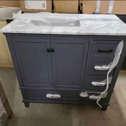 Merryfield 37 in. Single Sink Dark Blue-Grey Bath Vanity with White Carrara Marble Top (Assembled
New open bkx item 