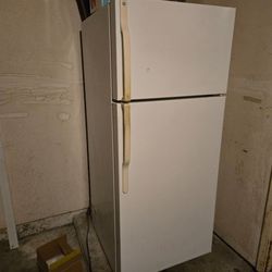 GE refrigerator works great , needs cleaning , was a spare in the garage